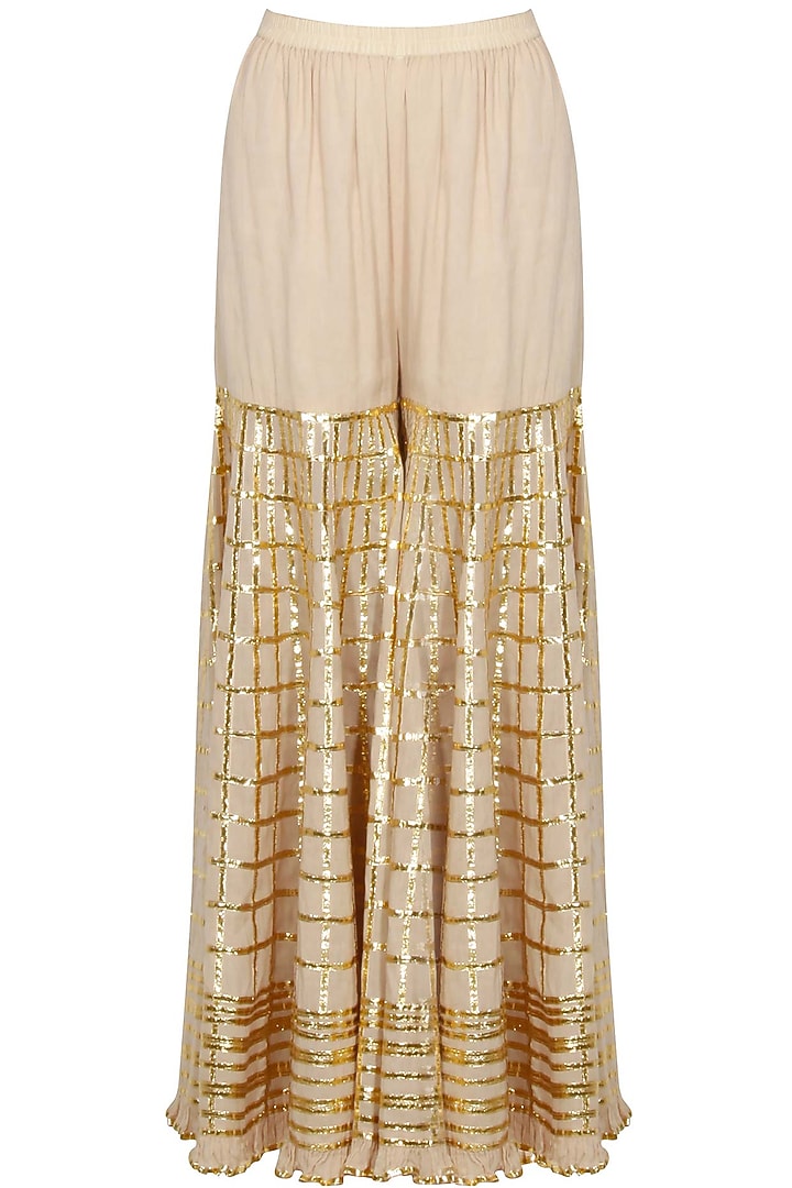 Bright yellow and gold gota patti work kurta and checkered sharara set available only at Pernia's Pop Up Shop.
