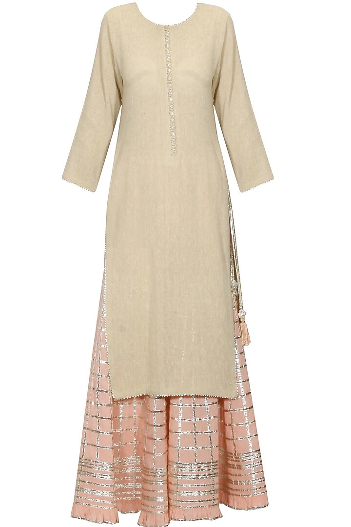 Beige gota patti work kurta and peach sharara pants set available only at Pernia's Pop Up Shop.