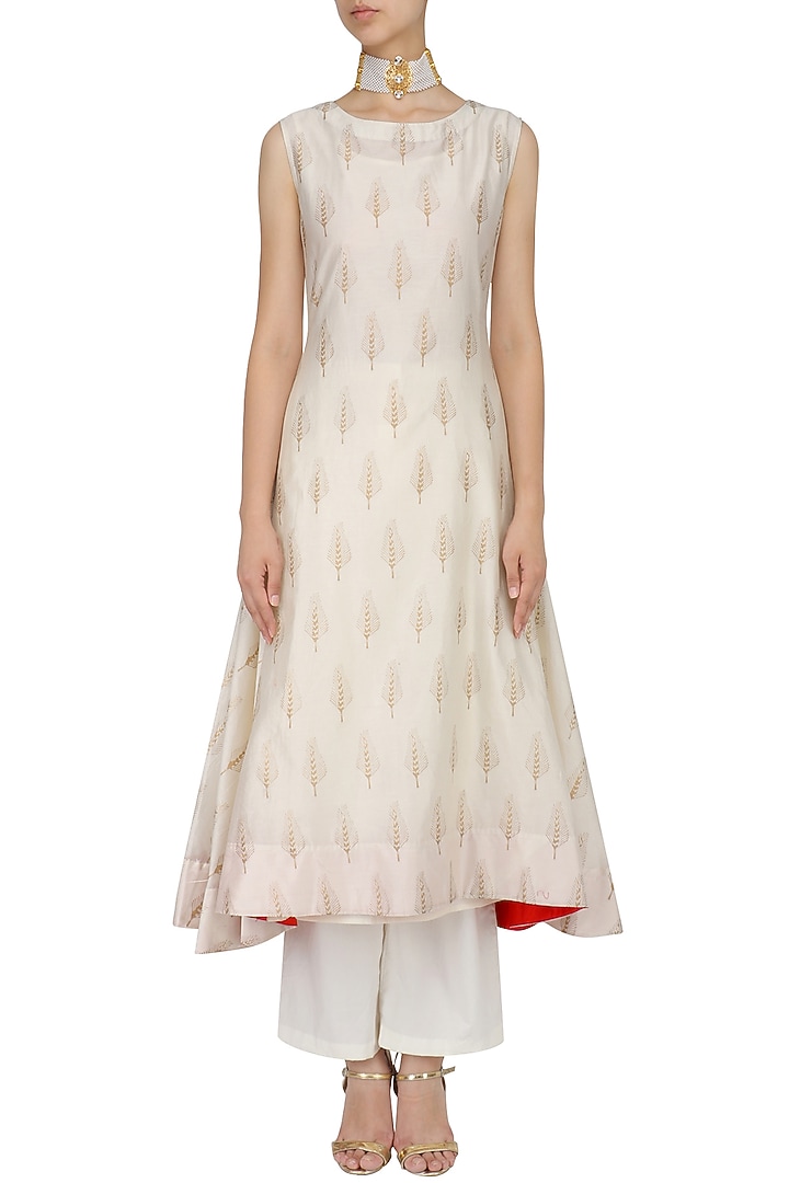 White asymmetrical kurta and palazzo pants set available only at Pernia's Pop Up Shop.