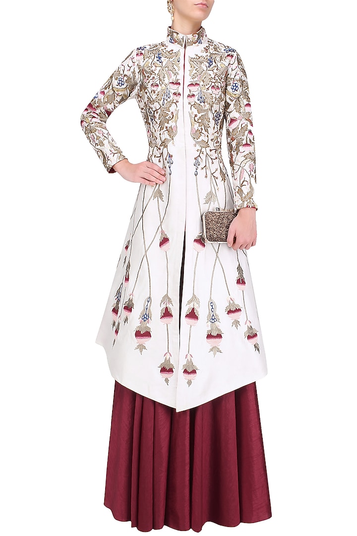 Off white silk thread and zari embroidered jacket with red skirt available only at Pernia's Pop Up Shop.