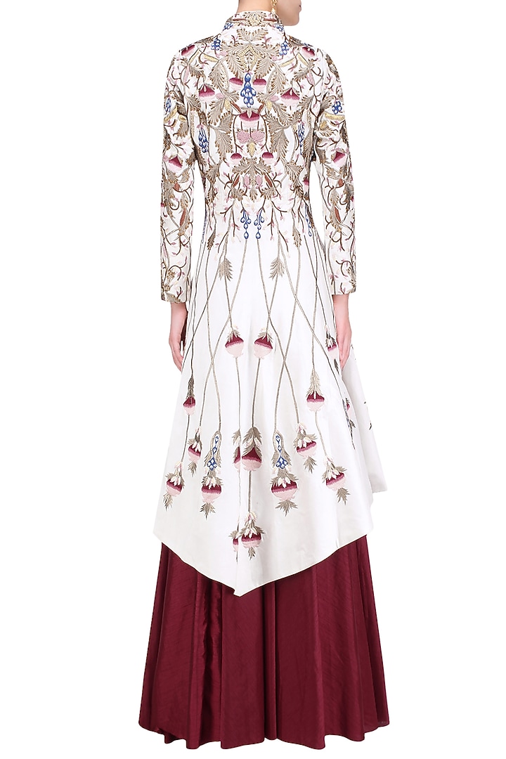 Off white silk thread and zari embroidered jacket with red skirt available only at Pernia's Pop Up Shop.