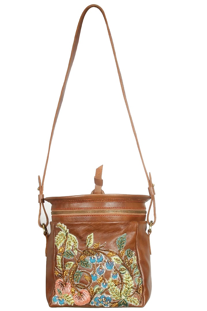Brown silk thread and zari embroidered round leather bag available only at Pernia's Pop Up Shop.