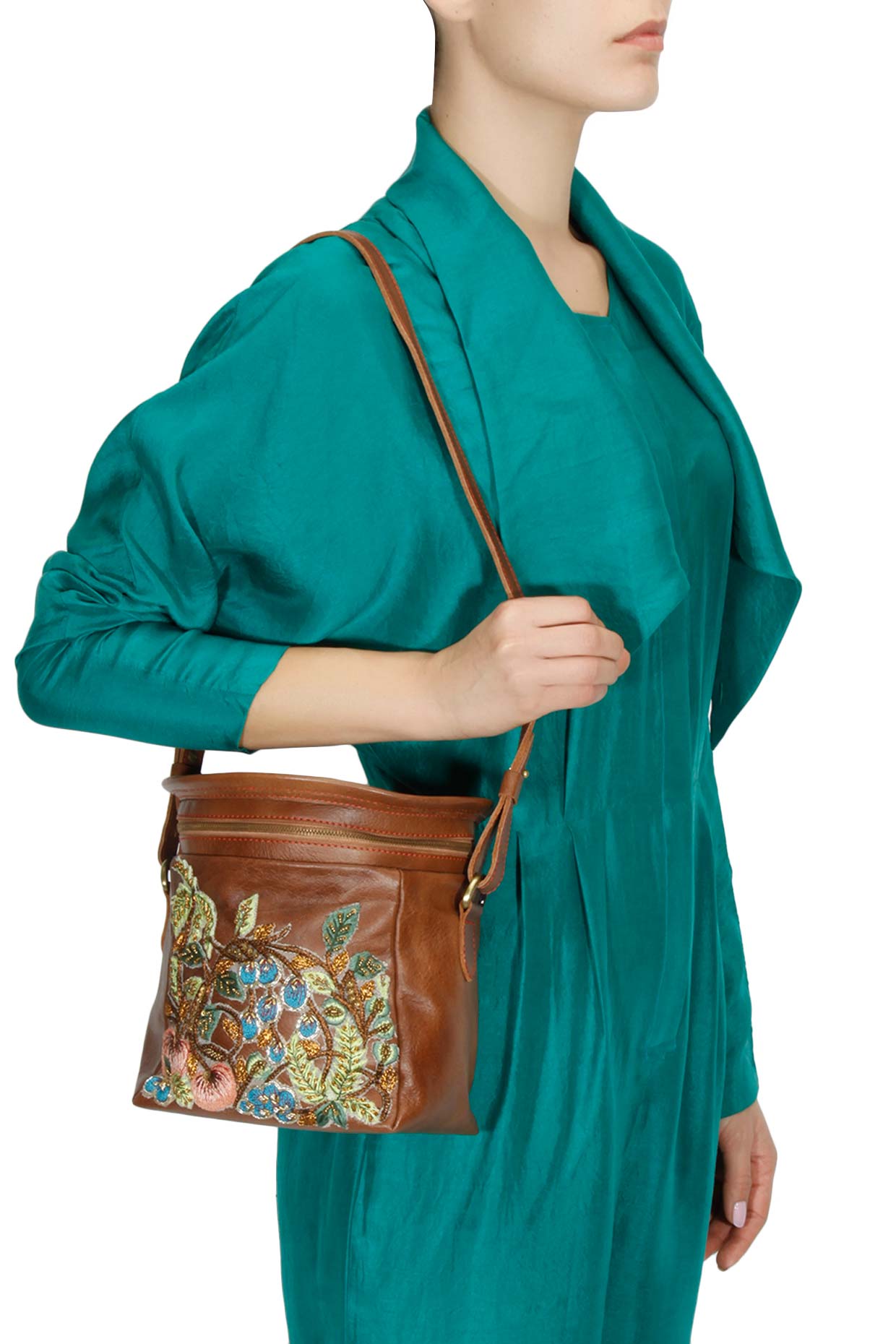 Brown silk thread and zari embroidered round leather bag available only at Pernia's Pop Up Shop.