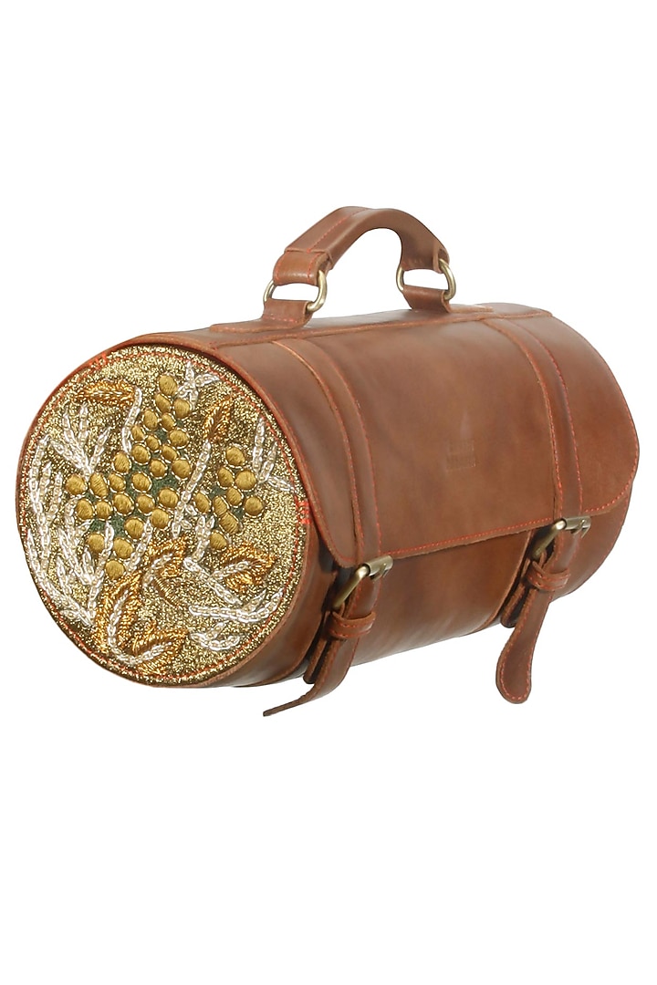 Brown silk thread and zari embroidered round cylindrical leather bag available only at Pernia's Pop Up Shop.