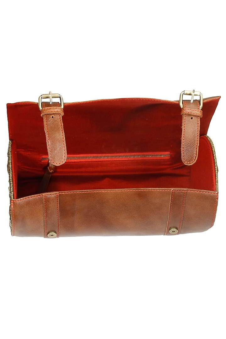 Brown silk thread and zari embroidered round cylindrical leather bag available only at Pernia's Pop Up Shop.
