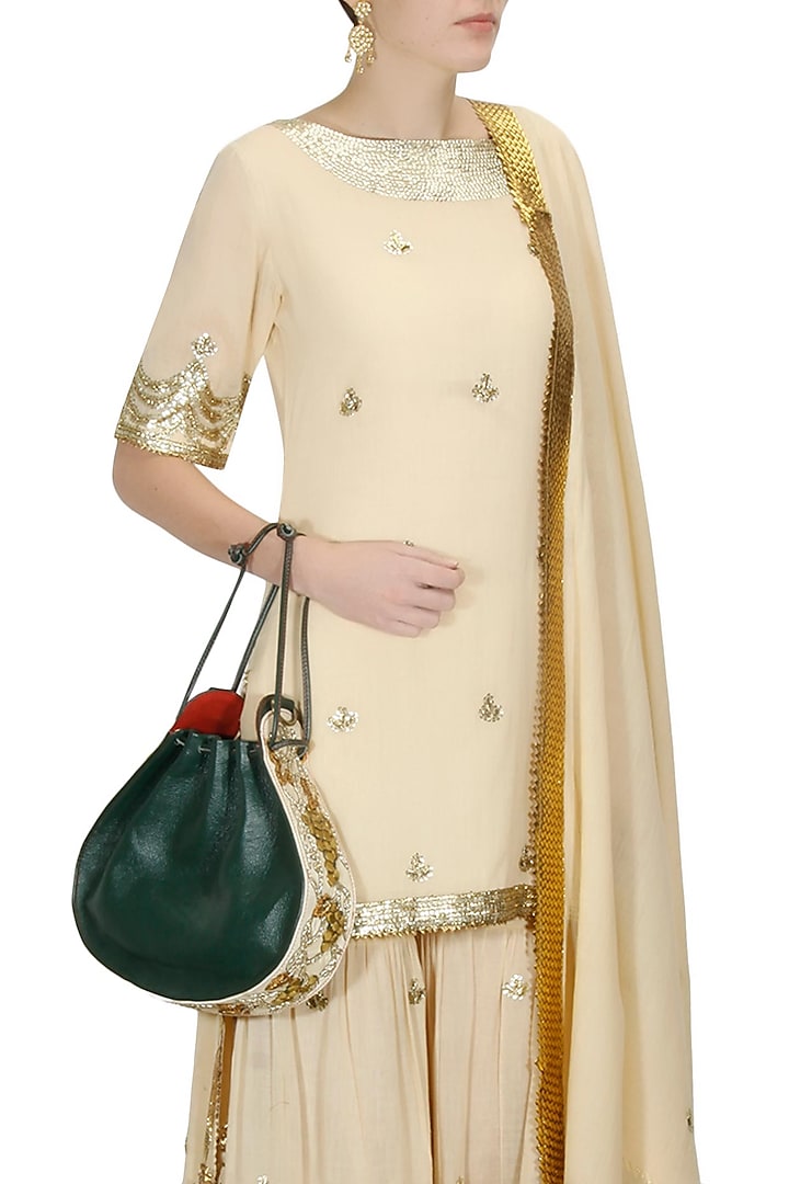 Olive green and white silk thread and dabka embroidered round leather bag by Samant Chauhan Accessories