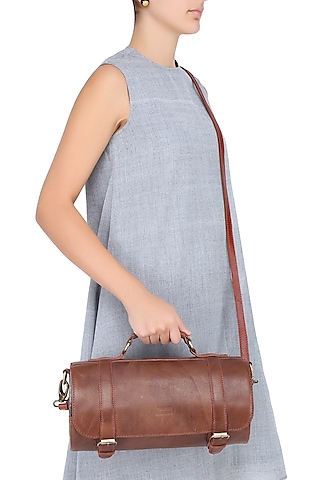 Brown Silk Thread and Zari Embroidered Cylindrical Leather Bag by Samant Chauhan Accessories