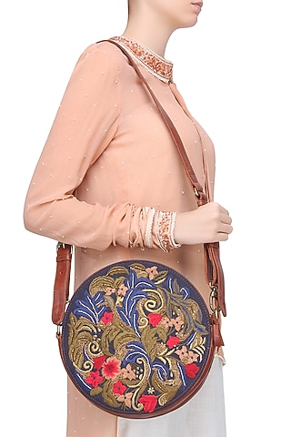 Brown and Blue Floral Embroidered Round Leather Bag by Samant Chauhan Accessories