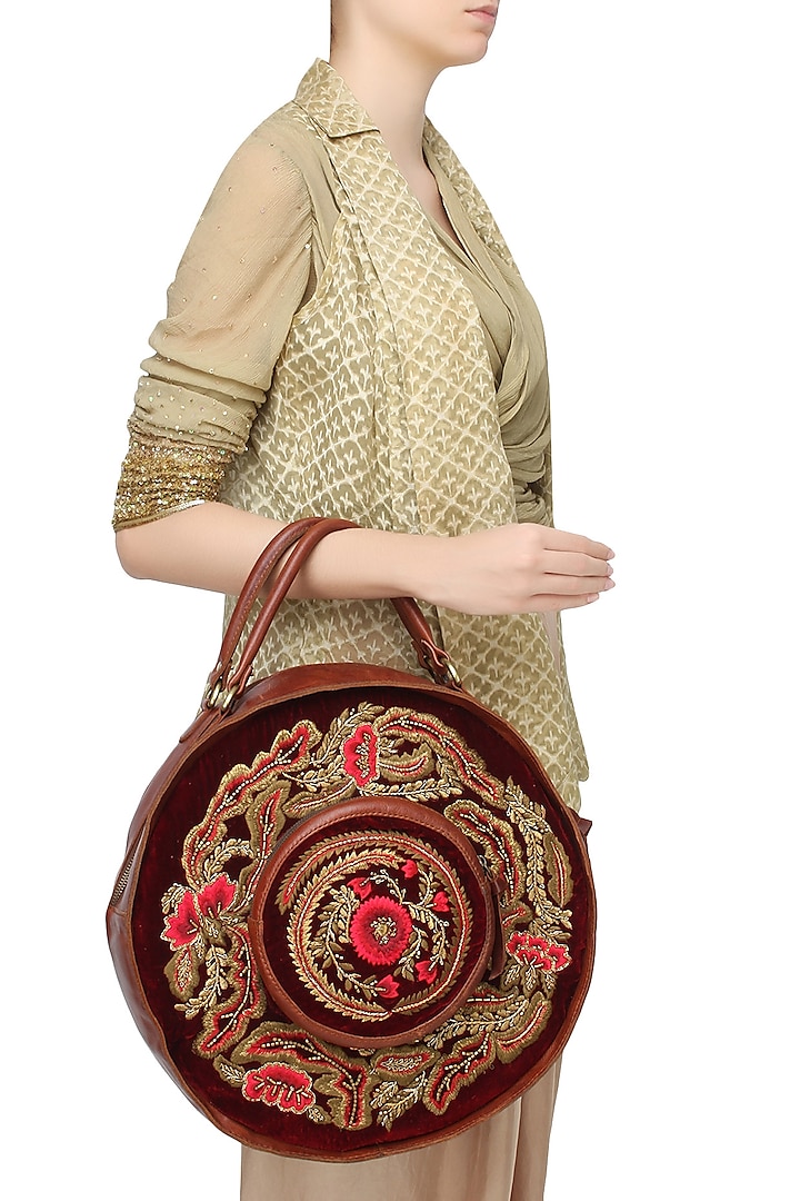 Brown and Maroon Floral Embroidered Round Leather Bag by Samant Chauhan Accessories