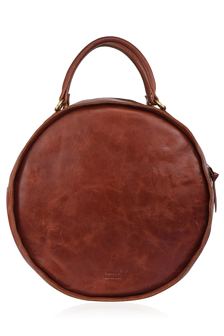 Samant Chauhan Accessories presents Brown and maroon floral embroidered round leather bag available only at Pernia's Pop Up Shop.