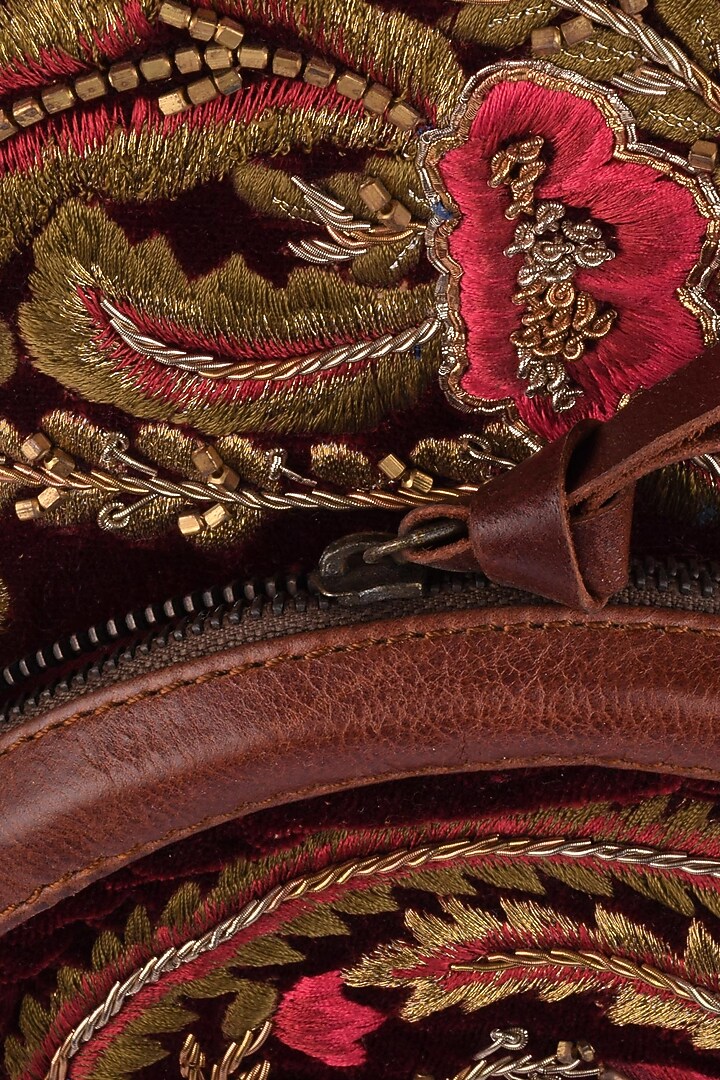 Samant Chauhan Accessories presents Brown and maroon floral embroidered round leather bag available only at Pernia's Pop Up Shop.