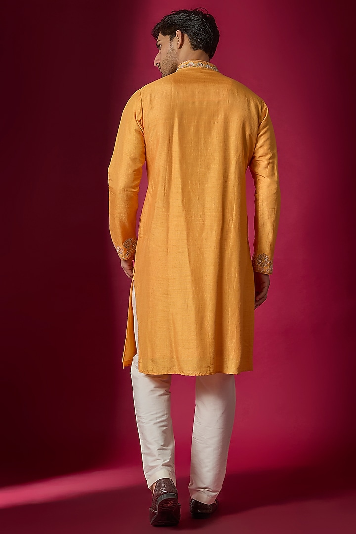 Orange Tussar Hand & Machine Embroidered Kurta Set by SAMMOHAN at Pernia's Pop Up Shop