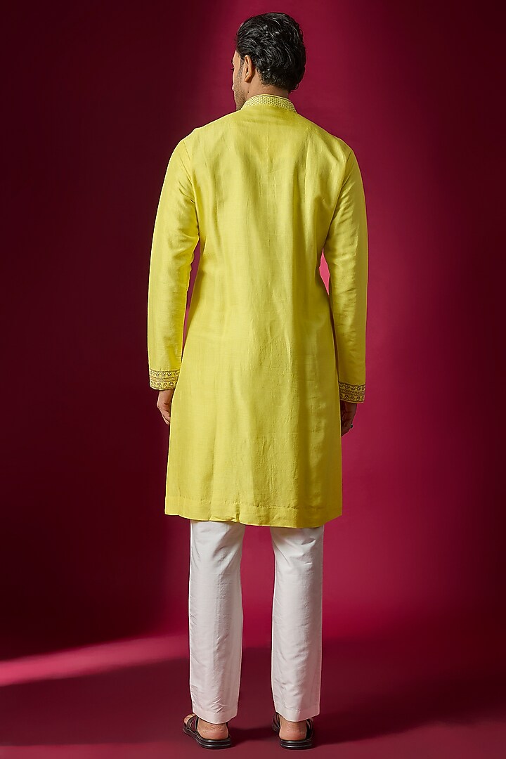 Yellow Tussar Hand & Machine Embroidered Kurta Set by SAMMOHAN at Pernia's Pop Up Shop
