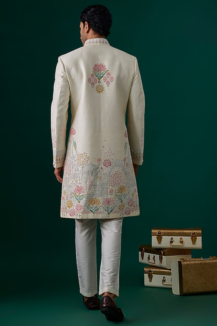 Ivory Raw Silk Hand & Machine Embroidered Groom Sherwani Set by SAMMOHAN at Pernia's Pop Up Shop