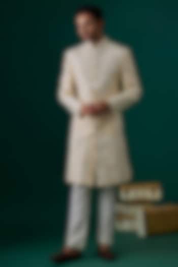 Ecru Raw Silk Hand & Machine Embroidered Groom Sherwani Set by SAMMOHAN at Pernia's Pop Up Shop