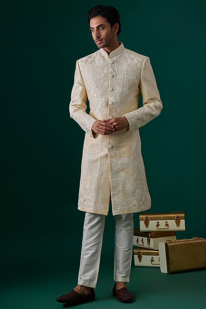 Ecru Raw Silk Hand & Machine Embroidered Groom Sherwani Set by SAMMOHAN at Pernia's Pop Up Shop
