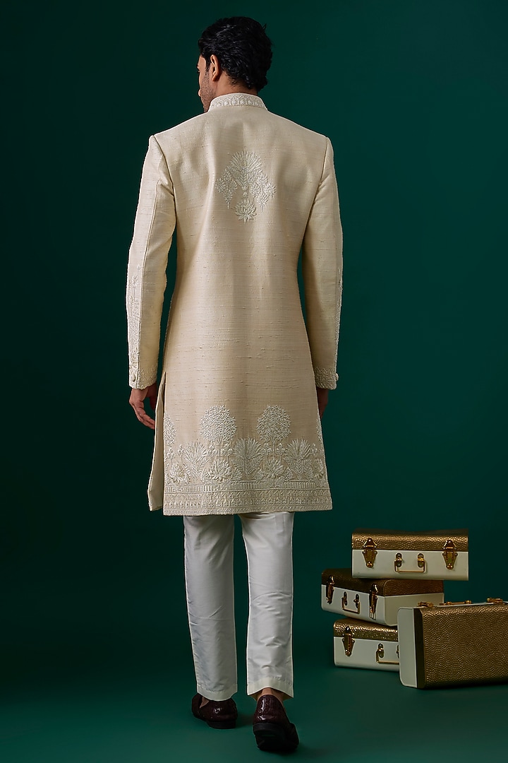 Ecru Raw Silk Hand & Machine Embroidered Groom Sherwani Set by SAMMOHAN at Pernia's Pop Up Shop