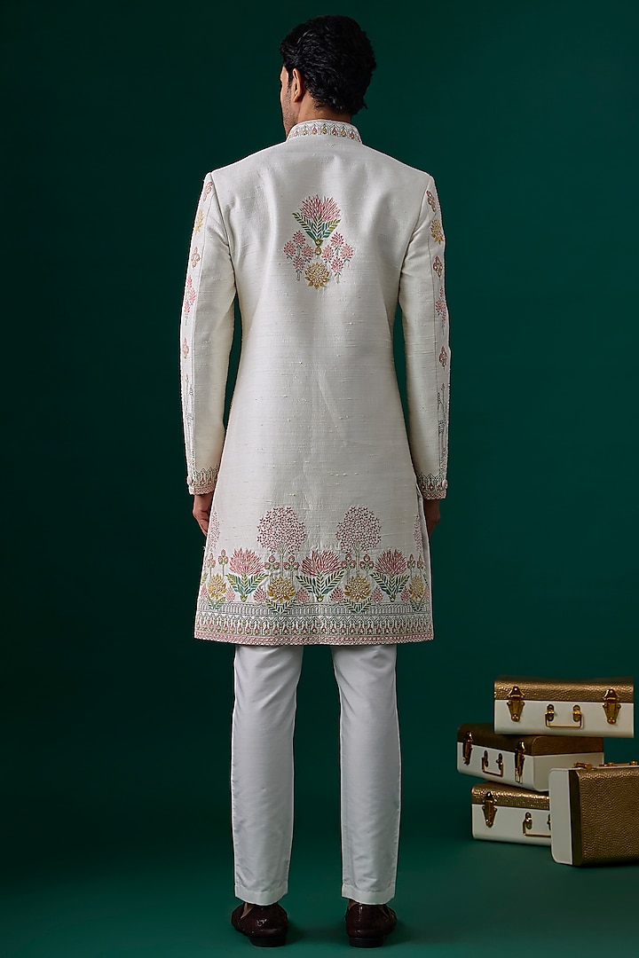 Ivory Raw Silk Hand & Machine Embroidered Groom Sherwani Set by SAMMOHAN at Pernia's Pop Up Shop