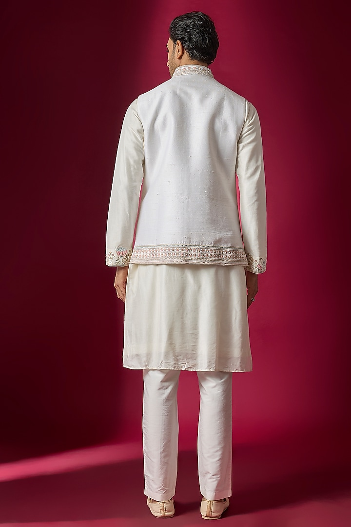 Off-White Raw Silk Resham Embroidered Bundi Jacket Set by SAMMOHAN at Pernia's Pop Up Shop