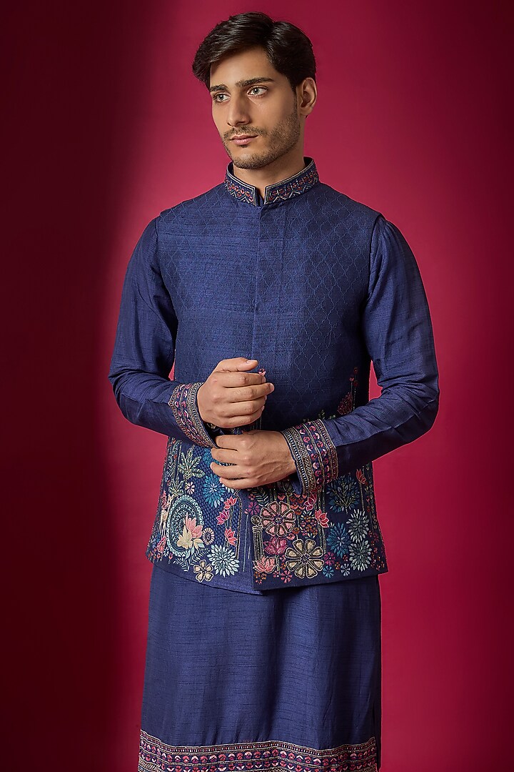 Navy Blue Raw Silk Resham Embroidered Bundi Jacket Set by SAMMOHAN at Pernia's Pop Up Shop