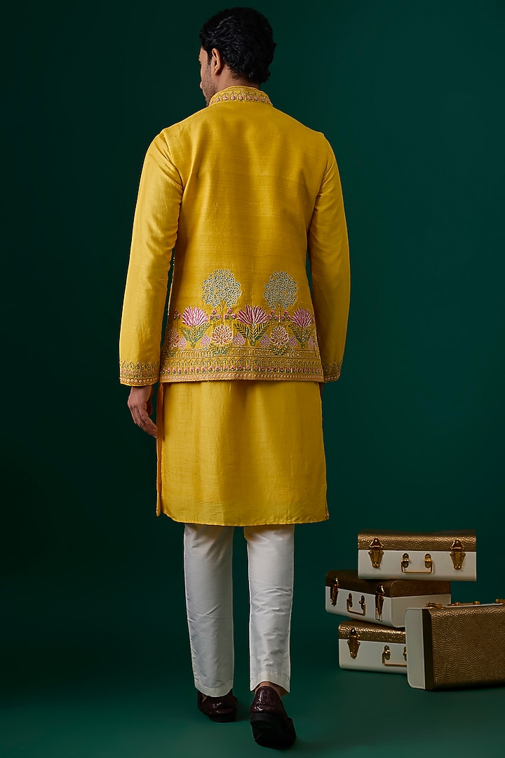 Yellow Raw Silk Hand & Machine Embroidered Bundi Jacket Set by SAMMOHAN at Pernia's Pop Up Shop
