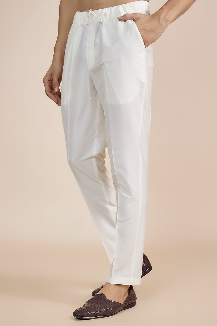 Ivory Silk Blend Mirror Embroidered Kurta Set by SAMMOHAN at Pernia's Pop Up Shop