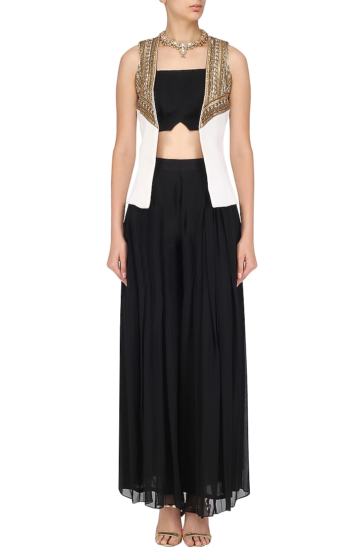 Black bustier, palazzo pants and white embellished jacket set available only at Pernia's Pop Up Shop.