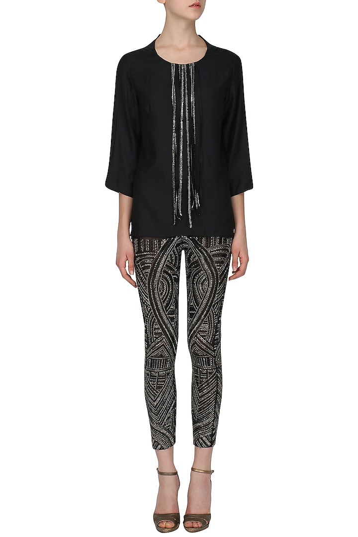 Black tasseled top with embroidered pants available only at Pernia's Pop Up Shop.
