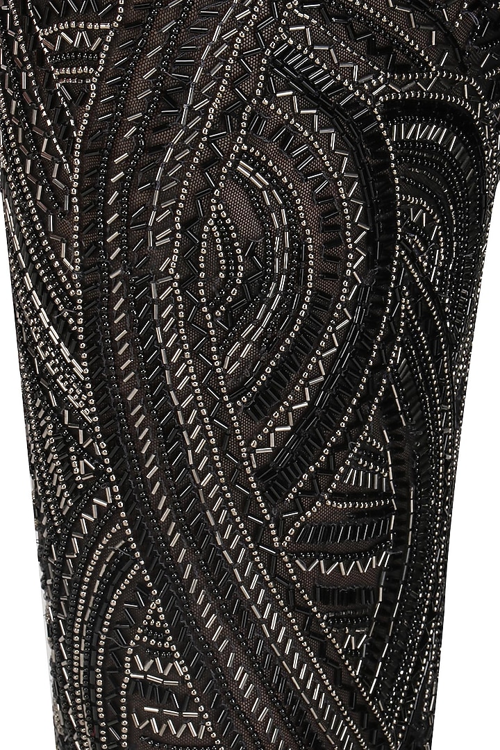 Black tasseled top with embroidered pants available only at Pernia's Pop Up Shop.