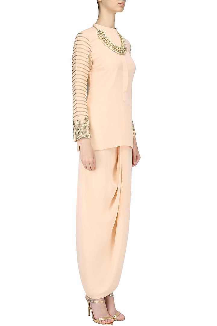 Peach embroidered tunic and dhoti skirt set available only at Pernia's Pop Up Shop.