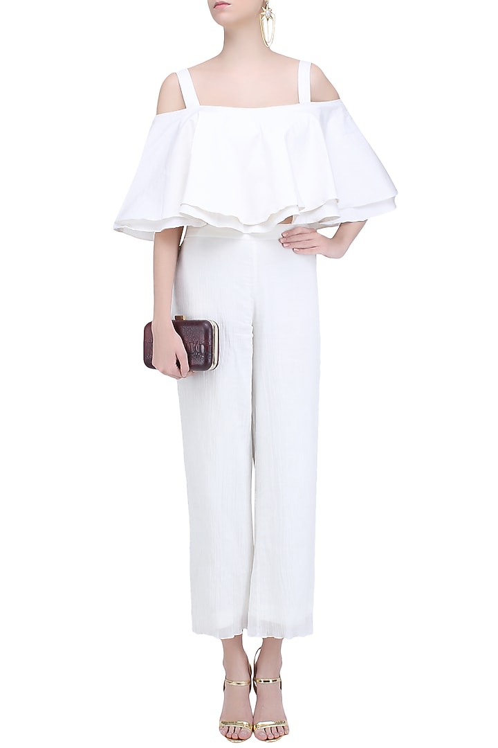 Ivory cold shoulder ruffled top and pants set available only at Pernia's  Pop Up