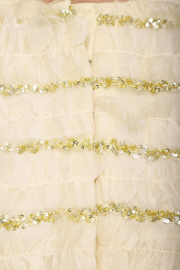 Nude embroidered lehenga with frayed jacket available only at Pernia's Pop Up Shop.