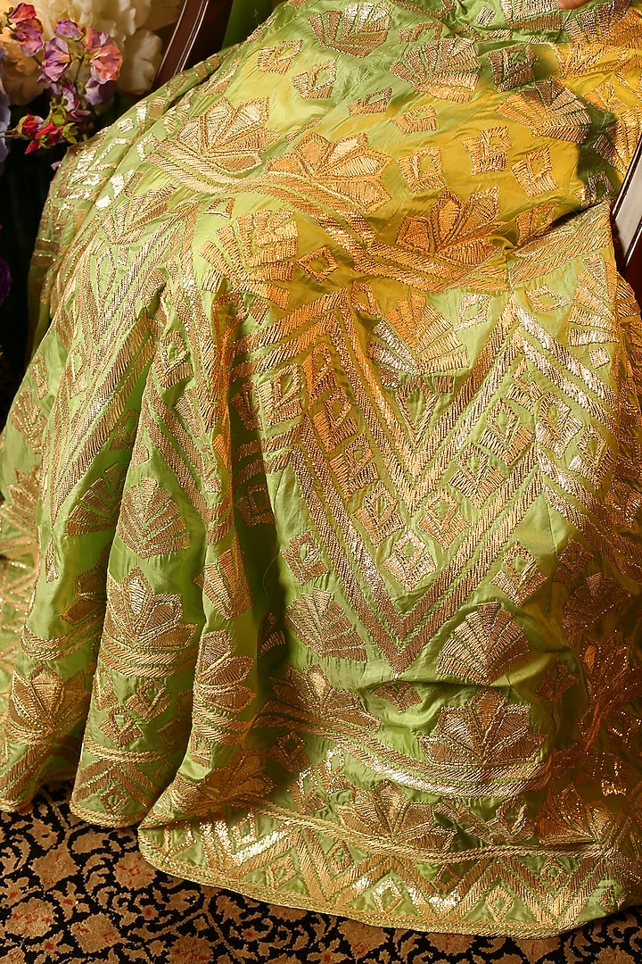 Mint green embroidered lehenga skirt with cape sleeves blouse available only at Pernia's Pop Up Shop.