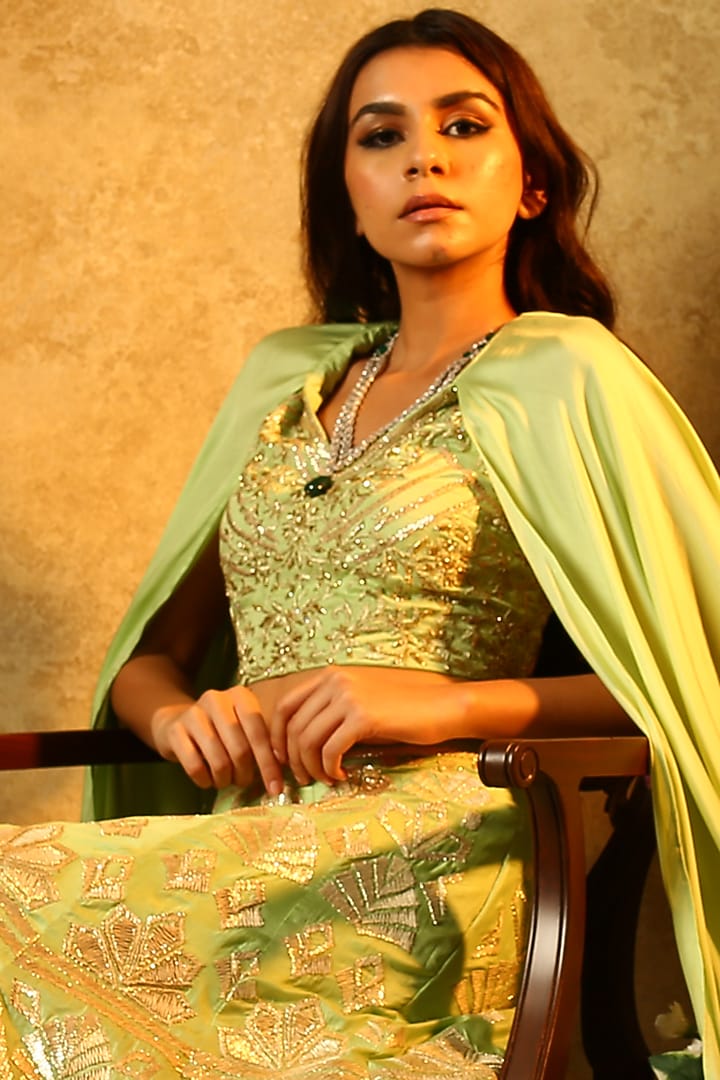 Mint green embroidered lehenga skirt with cape sleeves blouse available only at Pernia's Pop Up Shop.