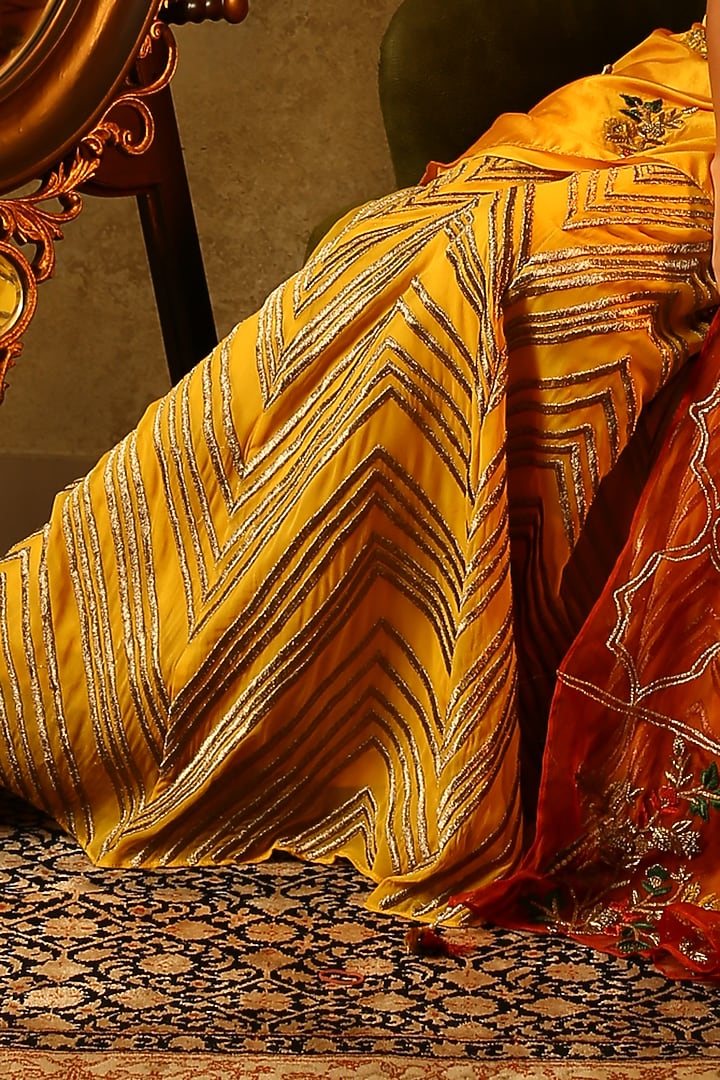 Yellow embroidered kurta with lehenga skirt set available only at Pernia's Pop Up Shop.