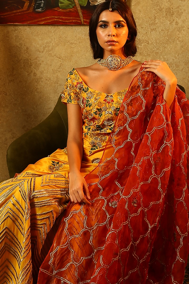 Yellow embroidered kurta with lehenga skirt set available only at Pernia's Pop Up Shop.