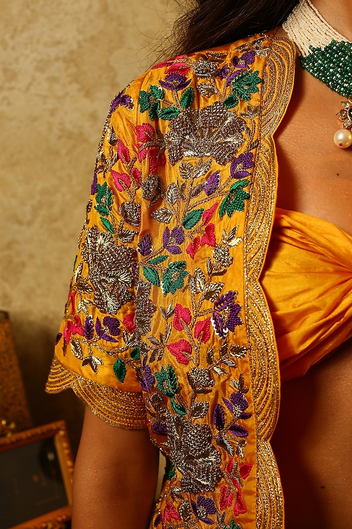 Yellow embroidered jacket with dhoti skirt and bustier available only at Pernia's Pop Up Shop.