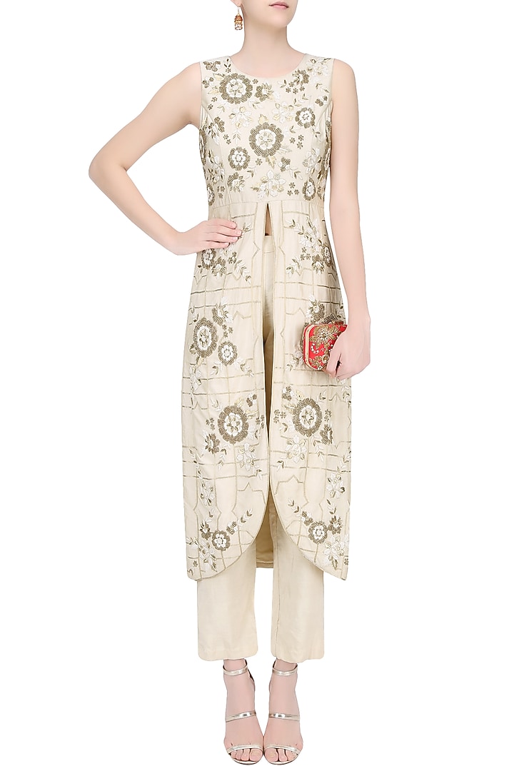 Cream floral embroidered front slit kurta and pants set available only at Pernia's Pop Up Shop.