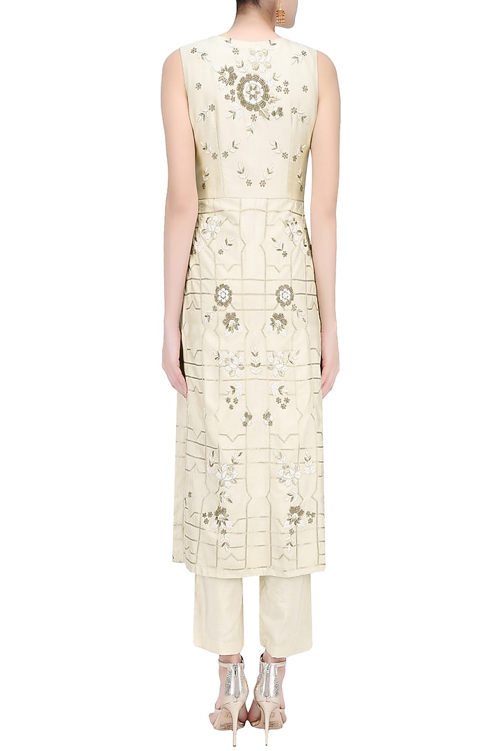 Cream floral embroidered front slit kurta and pants set available only at Pernia's Pop Up Shop.