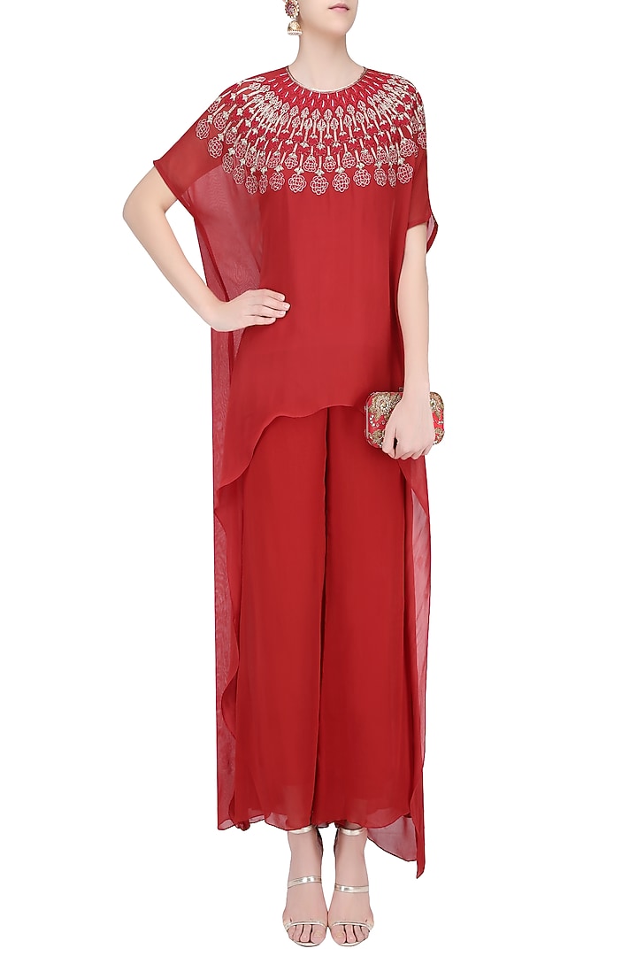 Crimson red resham embroidered high low kurta with beige pants available only at Pernia's Pop Up Shop.