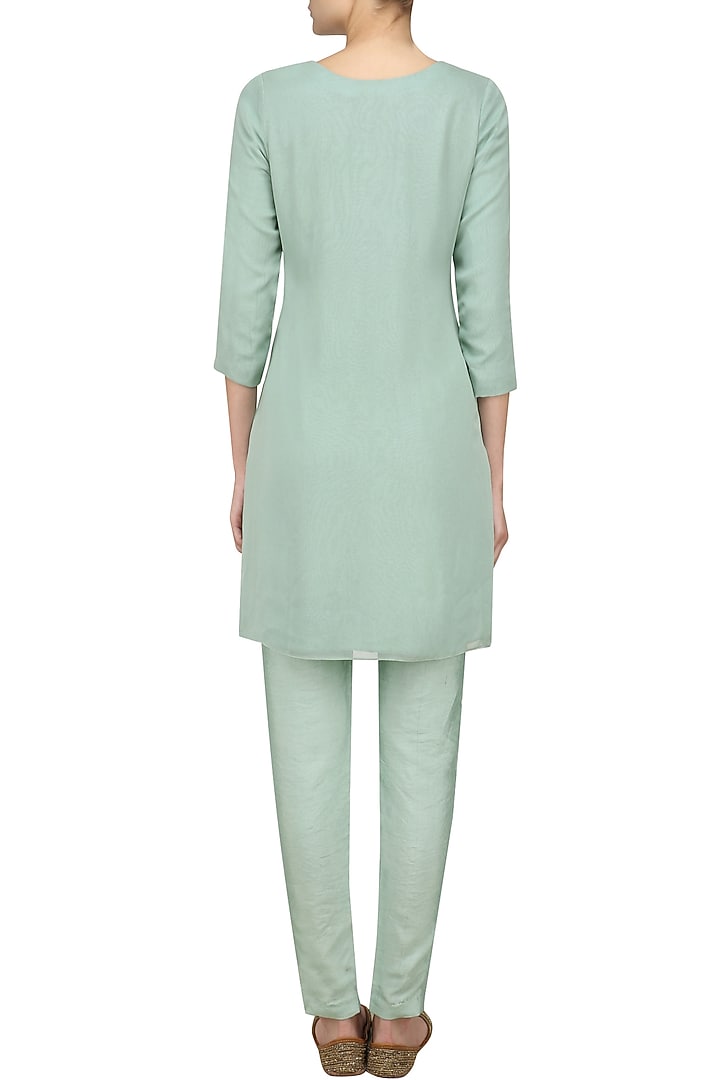 Pistachio green kasabh embroidered kurta and pants set available only at Pernia's Pop Up Shop.