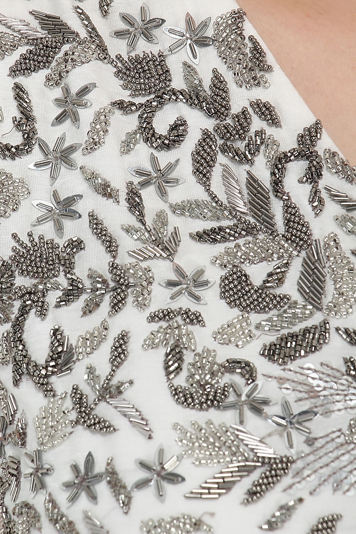 White embroidered top with draped skirt available only at Pernia's Pop Up Shop.