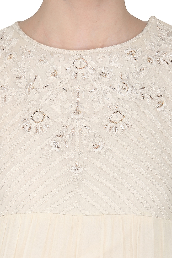 Ivory lucknowi embroidered kurta and palazzo pants set available only at Pernia's Pop Up Shop.