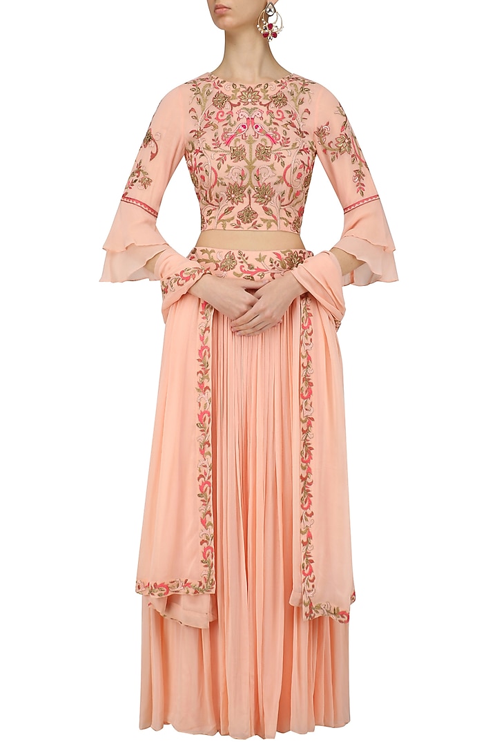 Peach pink dabka and zardozi embroidered lehenga se available only at Pernia's Pop Up Shop.