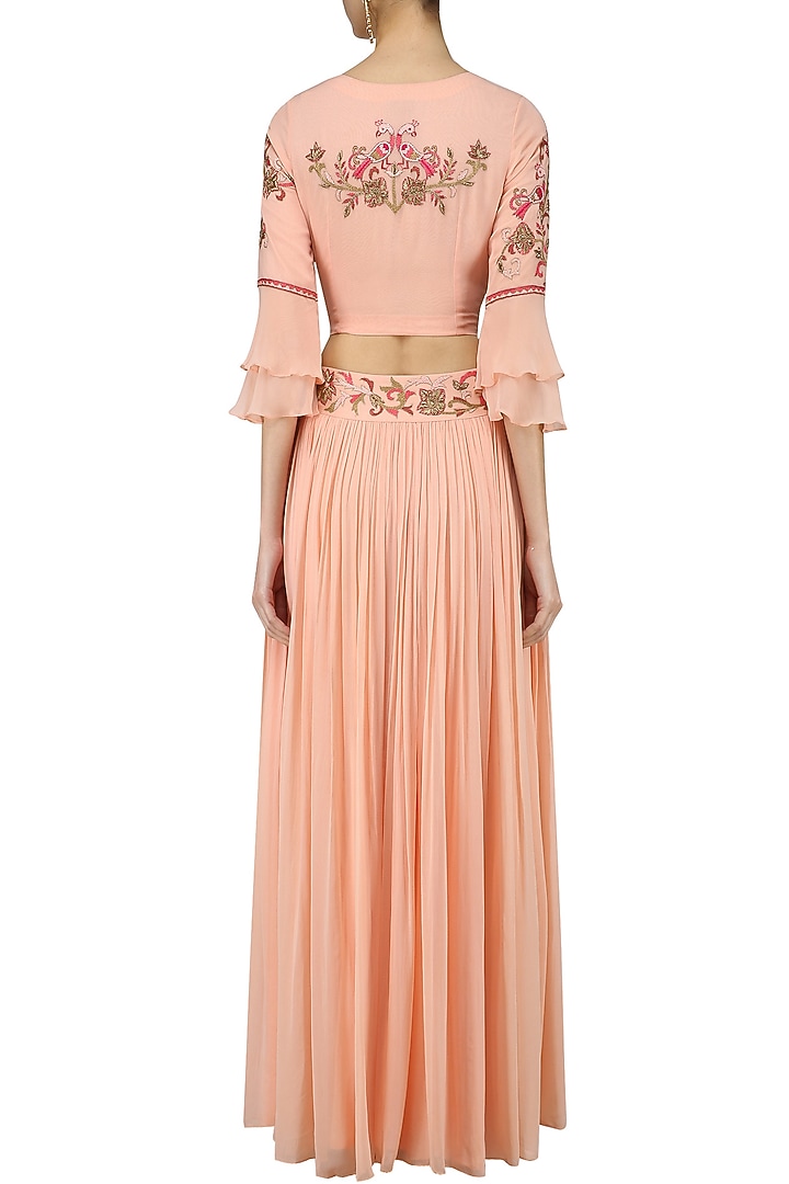 Peach pink dabka and zardozi embroidered lehenga se available only at Pernia's Pop Up Shop.