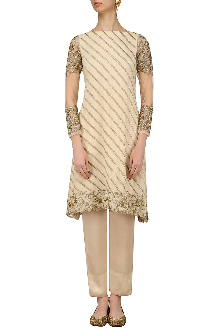 Beige gold and silver embroidered A line kurta and pencil pants set available only at Pernia's Pop Up Shop.