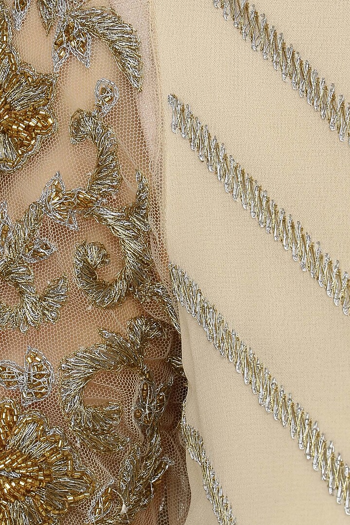 Beige gold and silver embroidered A line kurta and pencil pants set available only at Pernia's Pop Up Shop.