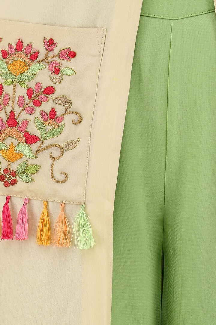 Cream floral embroidered front slit kurta and green palazzo set available only at Pernia's Pop Up Shop.