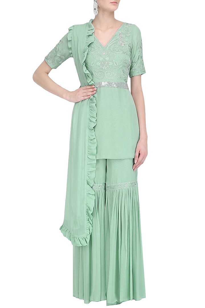 Pistachio green floral embroidered kurta and sharara pants set available only at Pernia's Pop Up Shop.