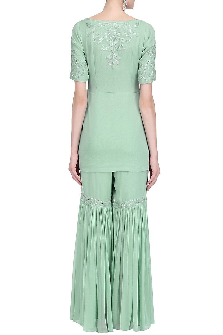 Pistachio green floral embroidered kurta and sharara pants set available only at Pernia's Pop Up Shop.